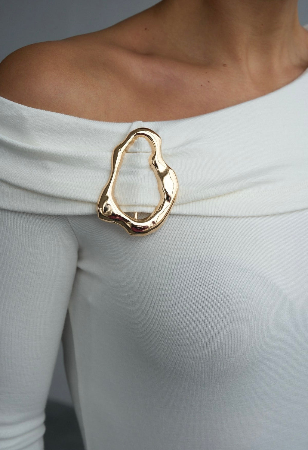 White off shoulder buckled top
