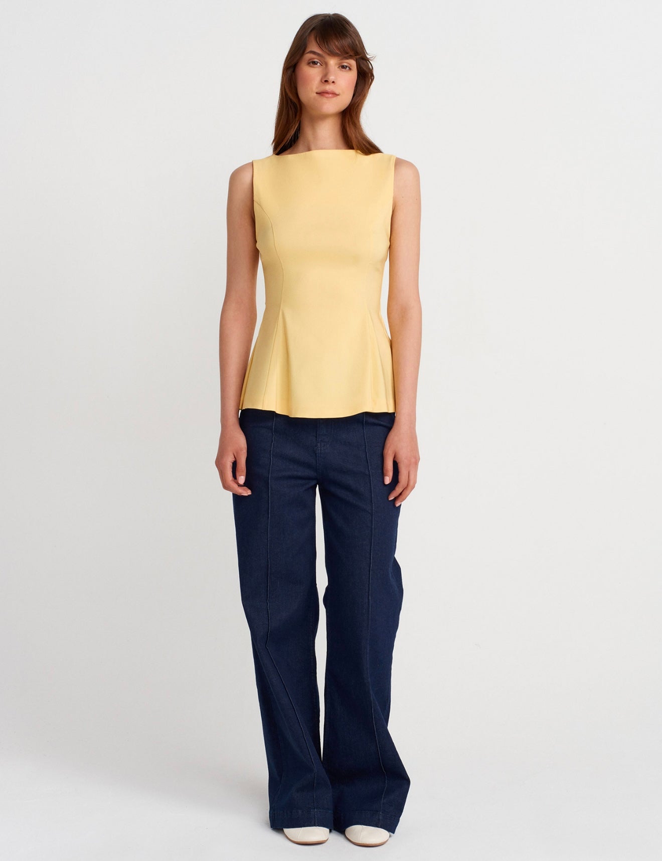 Shaped waist top